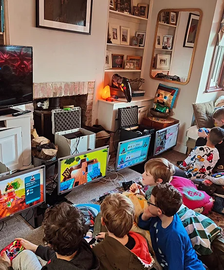 Children enjoying a hosted birthday gaming party