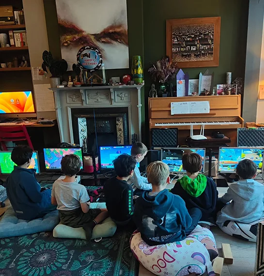 Children playing multiplayer console games together