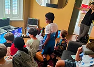 Children playing racing games at a birthday party