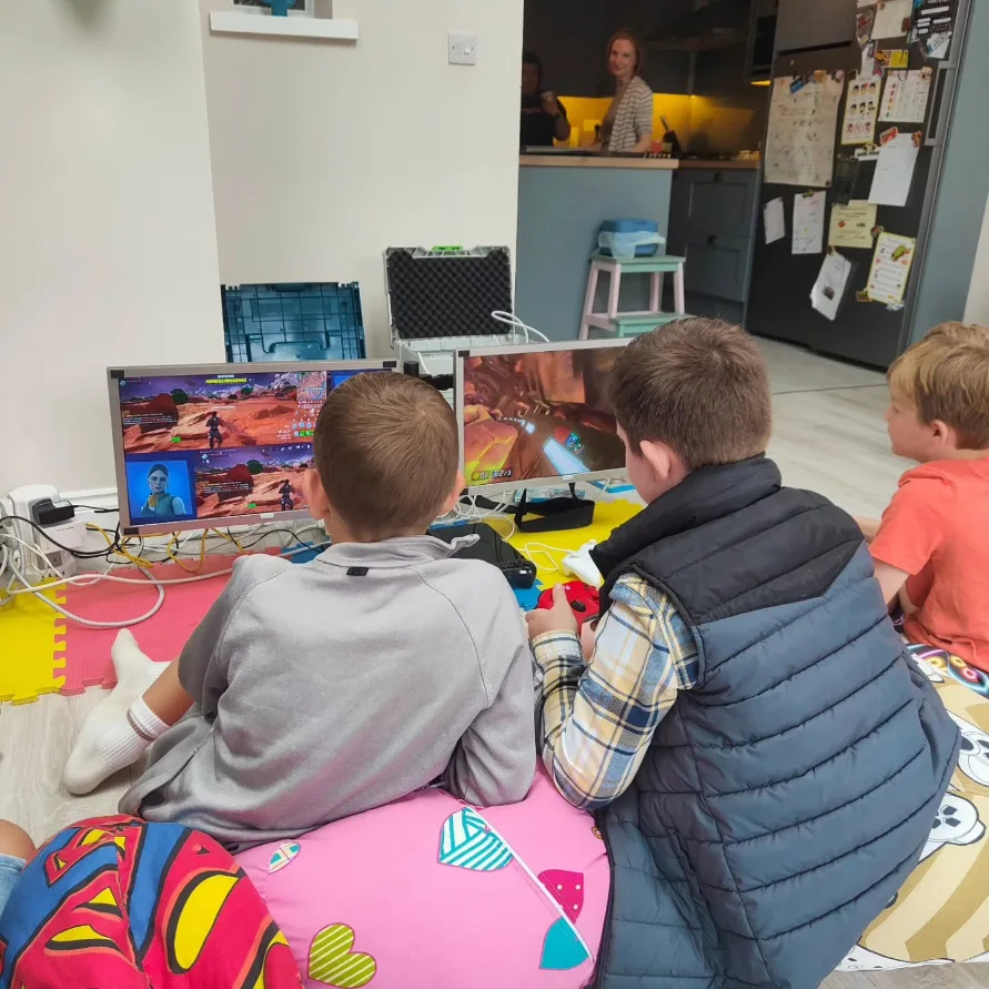 Guests enjoying a hosted gaming party in Catford