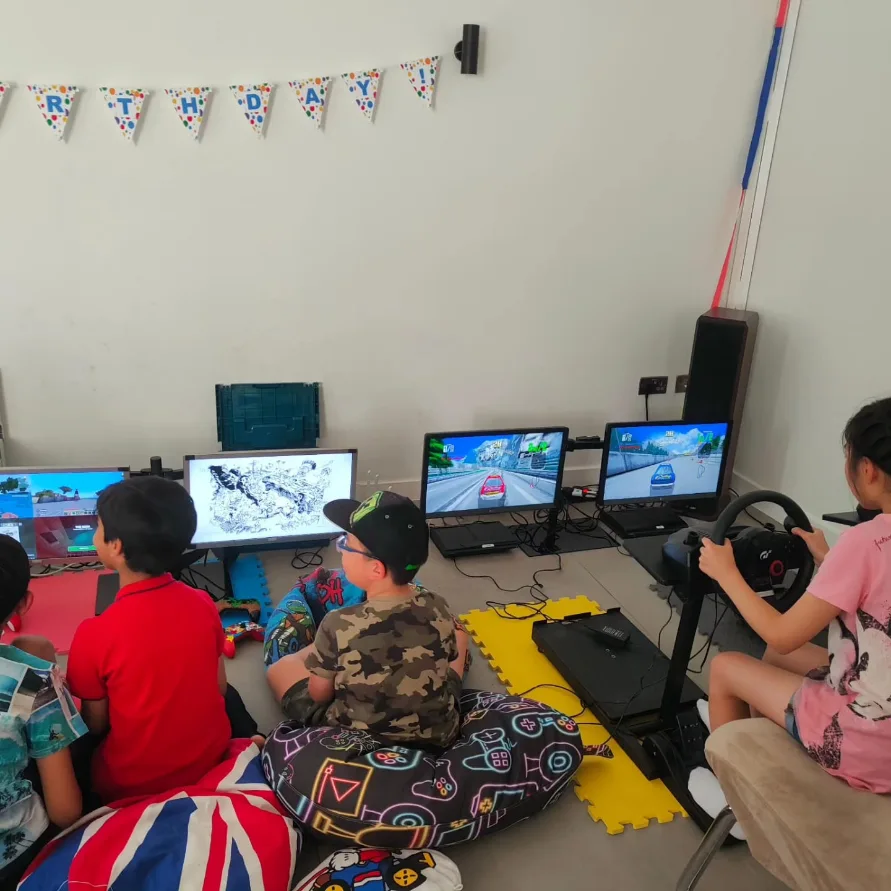 Guests enjoying a hosted gaming party in Dartford
