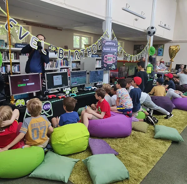 Young people taking part in multiplayer and racing games
